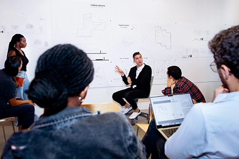 Students discussing research