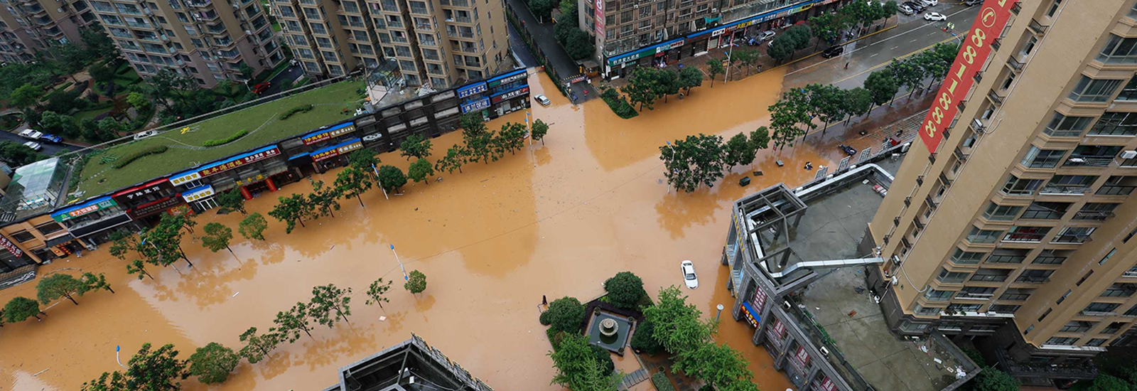 JIANGXI CHINA-June 19, 2016:members of the public in Jiujiang District Lian Road serious water street into a river, the roadside window car flooded, flooded, people travel disruption.